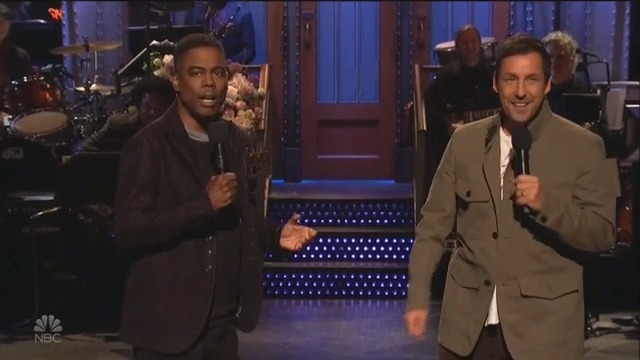 Adam Sandler Hosts SNL For First Time Ever, Sings ‘I Was Fired’ With Chris Rock