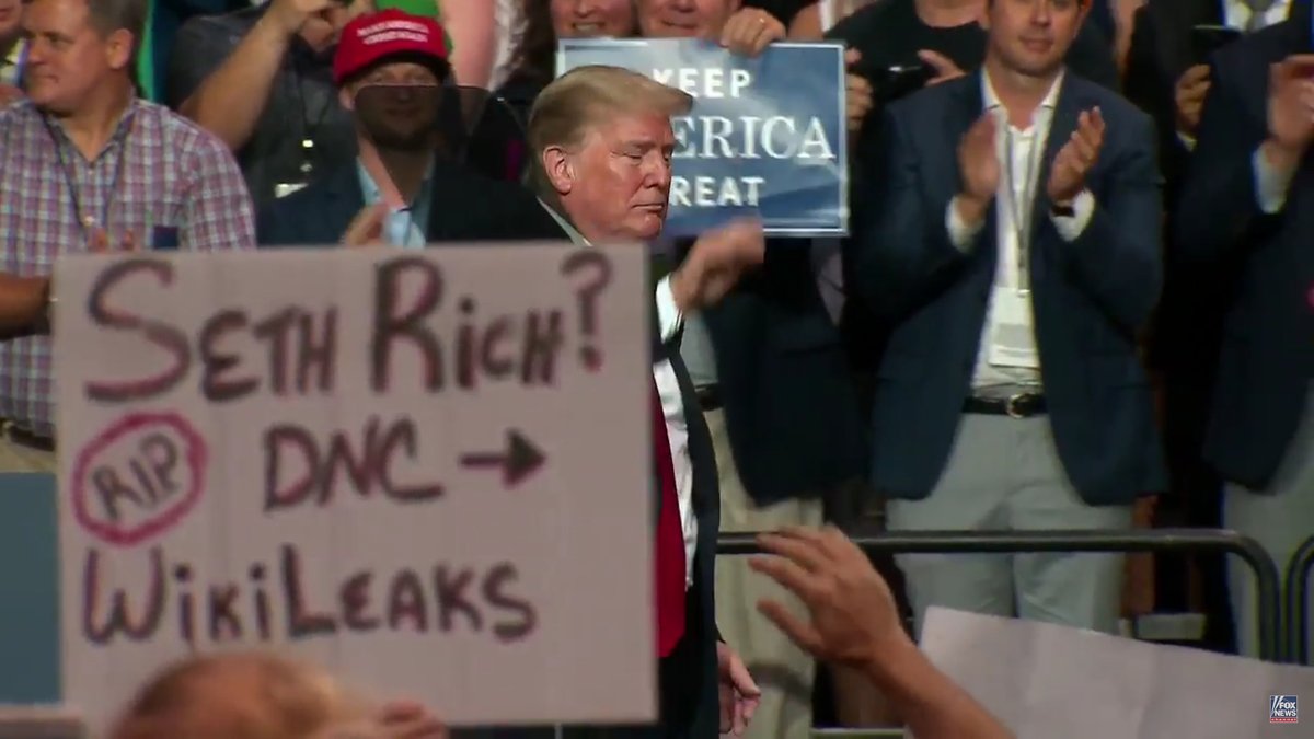 QAnon And Seth Rich Conspiracy Theorists All Over Trump Campaign Rally In Tampa