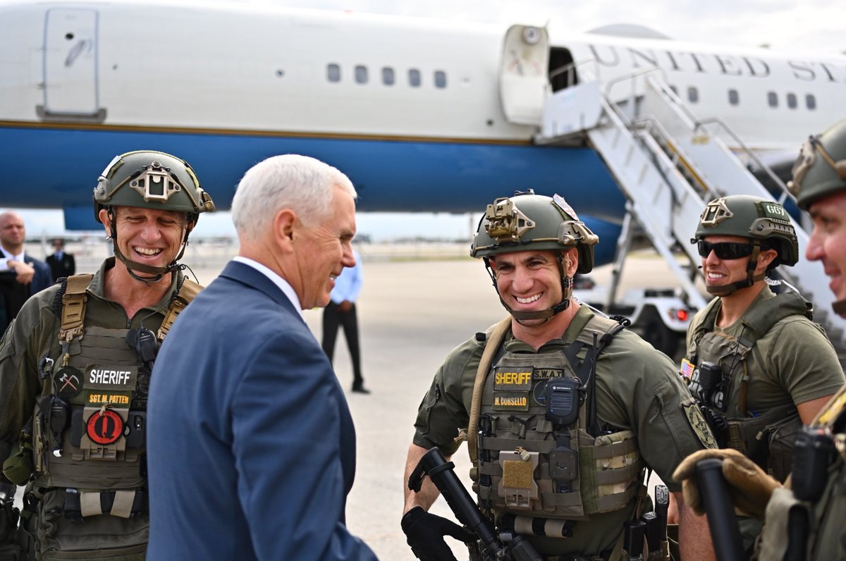 Florida Cop Who Wore QAnon Patch In Mike Pence Photo Demoted From SWAT Team
